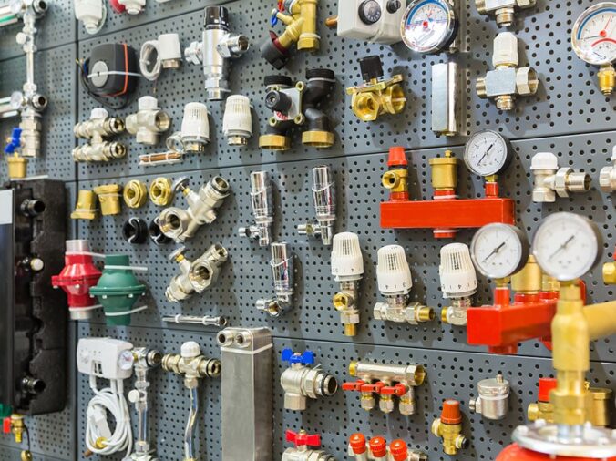 Brass plumbing valves, fittings and guages in a plumbing supply shop